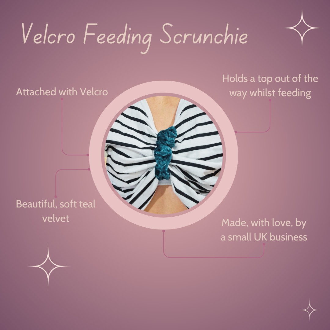 Teal velvet velcro feeding scrunchie holding a stripy black and white top