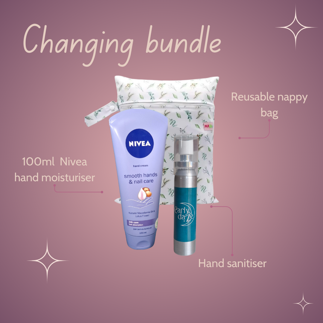 Changing bundle with Nivea hand moisturiser, hand sanitiser and reusable nappy bag on a pink background